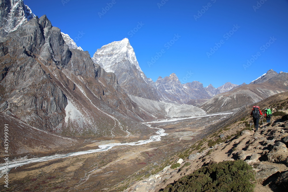 View of Taboche and Cholatse from hiking trail near Dingboche village, Nepal