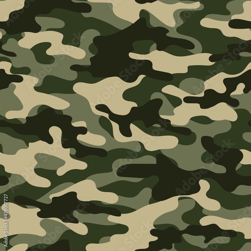 Digital camouflage seamless green pattern. Military texture. Abstract army or hunting masking ornament. Classic background. Vector design illustration.