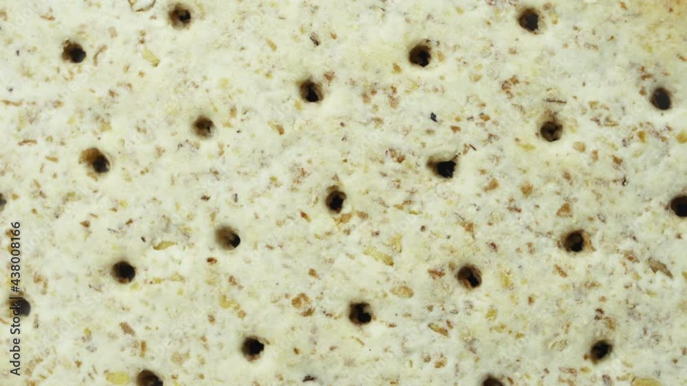 Biscuits with a detailed textured surface are rotated close up. Macro. Biscuits with a detailed textured surface are rotated close up. Macro.