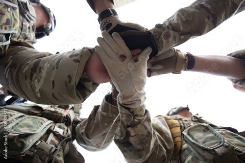 World War II, the worrier scene of the Entente Powers or Allies and Axis. The scene and arms in World War 2. Soldier hand together as power and peace