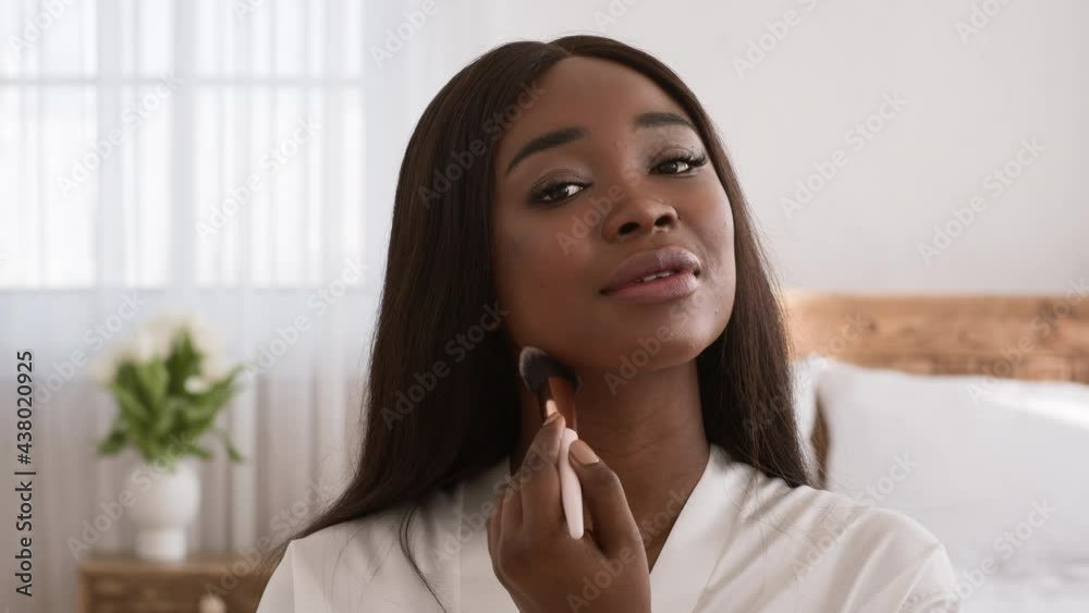 Playful African American Lady Making Makeup With Cosmetic Brush Indoors Playful African American Lady Making Makeup With Cosmetic Brush Indoors