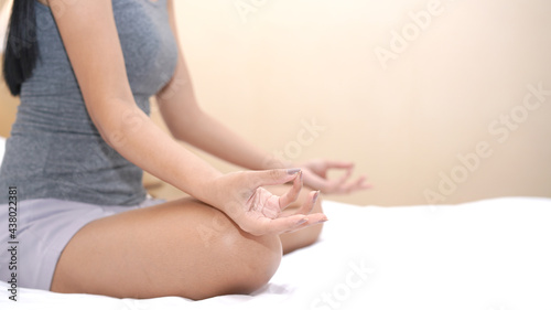 Wallpaper Mural Yoga meditation on bed. Mudras is a type of finger position to make peace and mind to Chakr. Torontodigital.ca