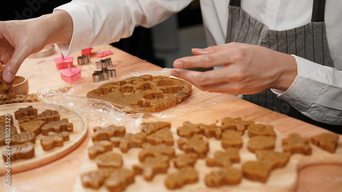 Ginger bread cookies homemade cooking for Christmas traditional dessert. Kids and family love to prepare to make dough and bake them. Then paint them with sugar paste to decor in many colors.