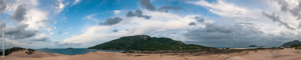 Ultra wide panoramic landscape of the dunes between the beaches Praia dos Ingleses and Praia do Santinho on a marvelous sunny day in Florianopolis. Beautiful destinations concept. 