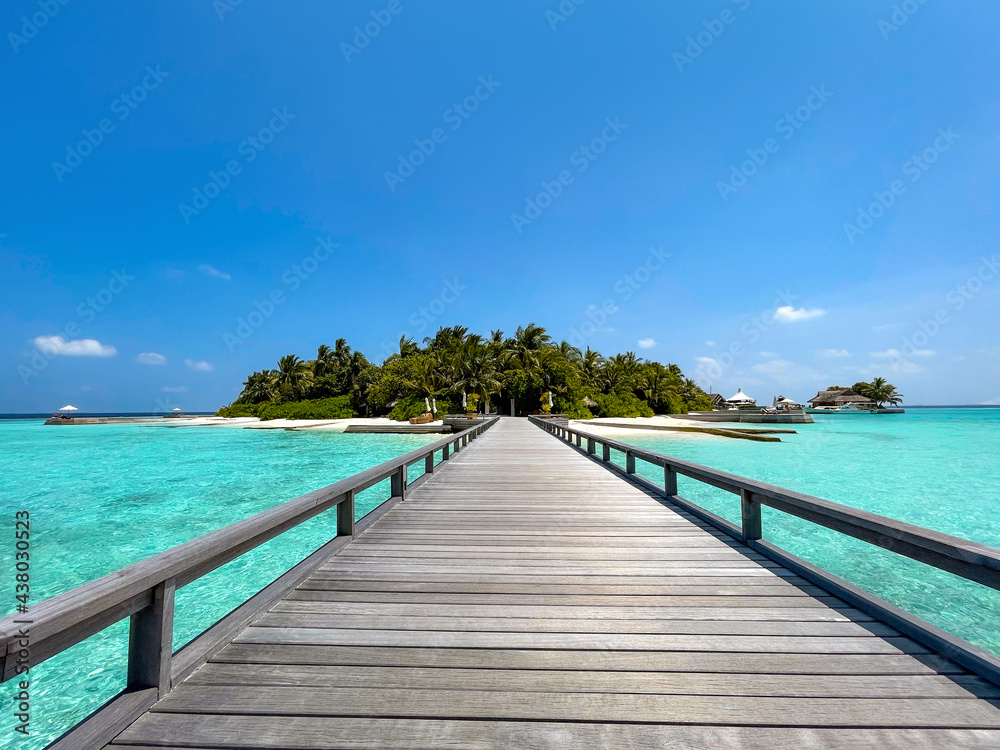 Maldives paradise scenic landscape. Seascape with water bungalows, turquoise sea and lagoon waters, tropical nature. Exotic tropical island beach background. Romantic holiday & honeymoon destination.