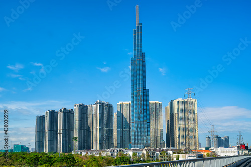 Landmark 81 skyscraper on a sunny morning, this is the economic, entertainment, luxury housing center in Ho Chi Minh City, Vietnam © huythoai