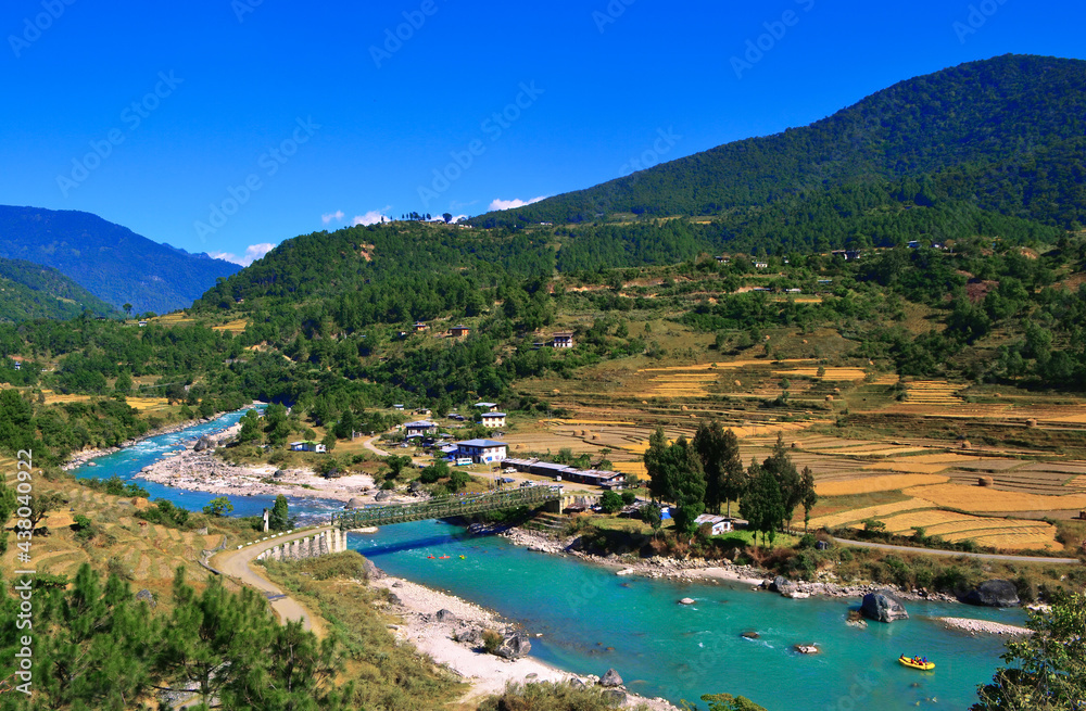 Beautiful valley in Bhutan where people do kayaking and boating