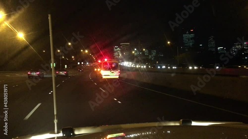 Paramedic ambulance rushing on highway photo