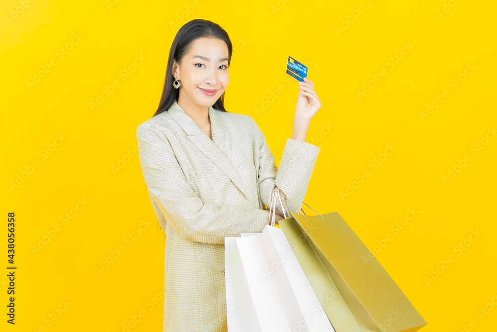 Portrait beautiful young asian woman smile with shopping bag Portrait beautiful young asian woman smile with shopping bag