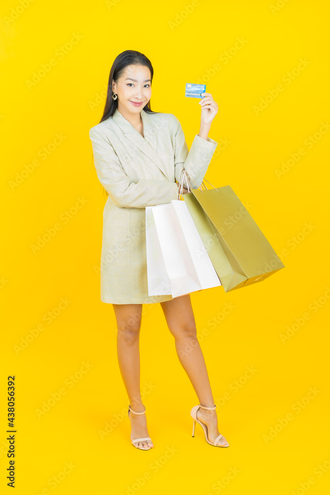 Portrait beautiful young asian woman smile with shopping bag Portrait beautiful young asian woman smile with shopping bag