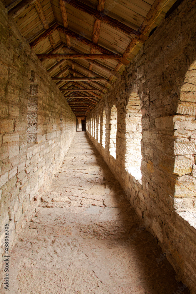 ancient corridor of the stone battle fortress in perspective, Oreshek Fortress, Shlisselburg, Leningrad Region, May 2021