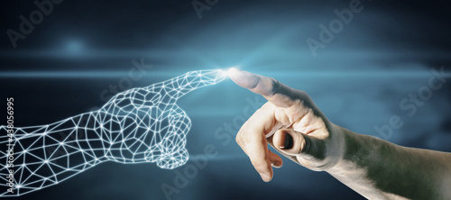 Businessman hand pointing at polygonal hand on dark blue background. Robotics and digital transformation concept. photo