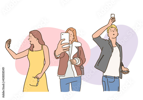People are taking selfies with their phones. hand drawn style vector design illustrations. 