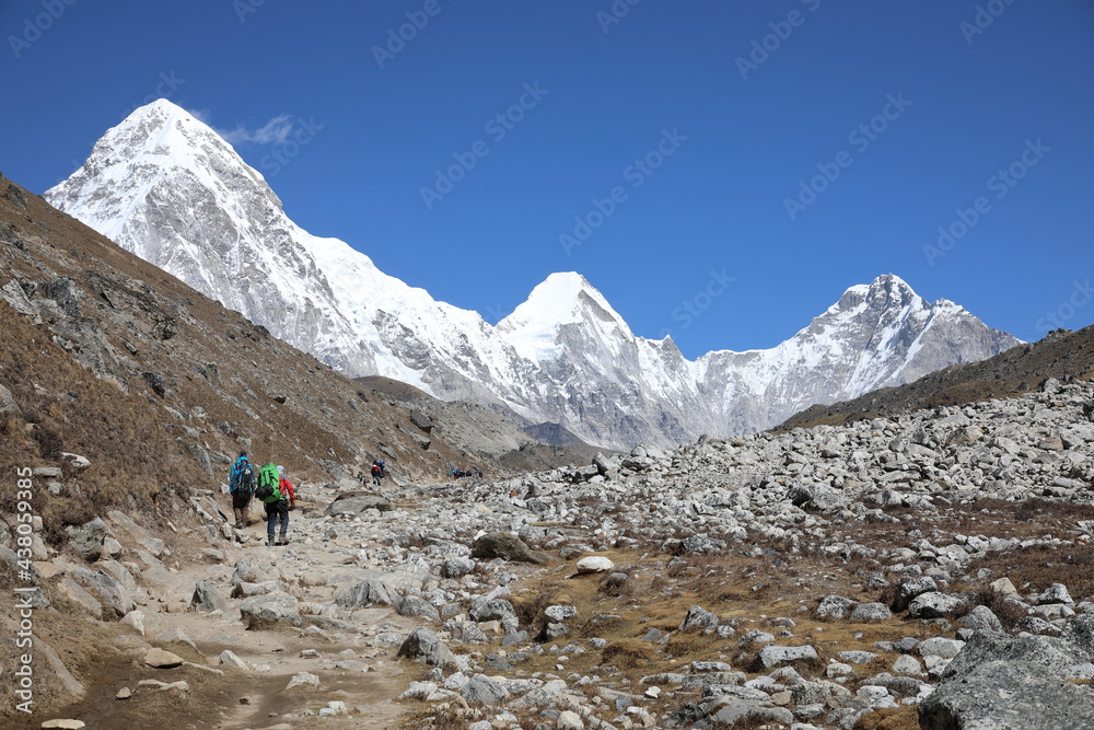 Naklejka premium View of Pumori from hiking trail near Lobuche, Nepal