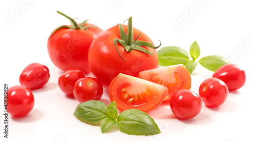 fresh tomato with basil on white background
