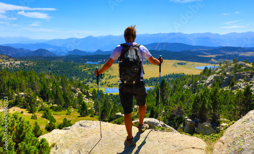 man hiker enjoying mountain view