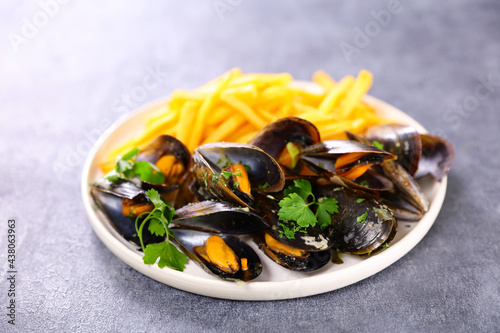 plate of mussel and french fries