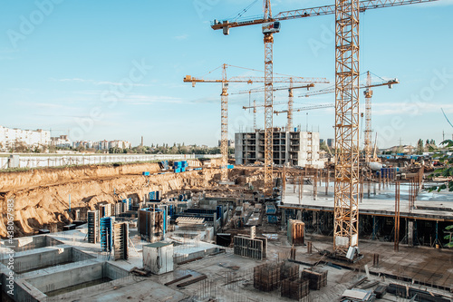 Construction and construction of high-rise buildings, the construction industry with working equipment and workers. 