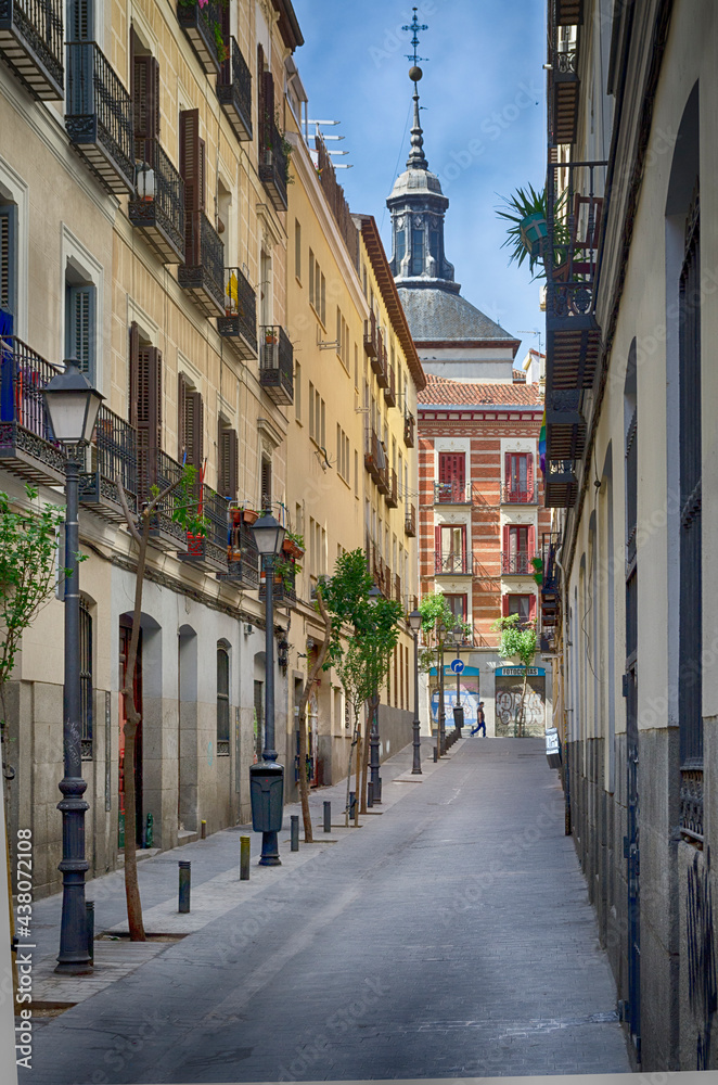 A street of Madrid with a church at the end