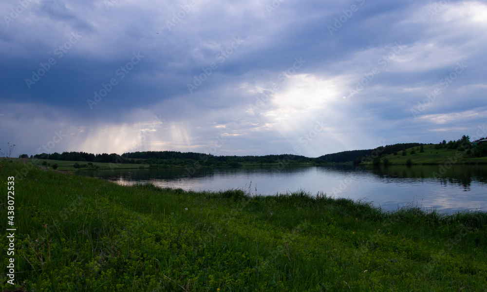 Stormy sky over the Sinyachikha River in the Sverdlovsk region (Ural, Russia)