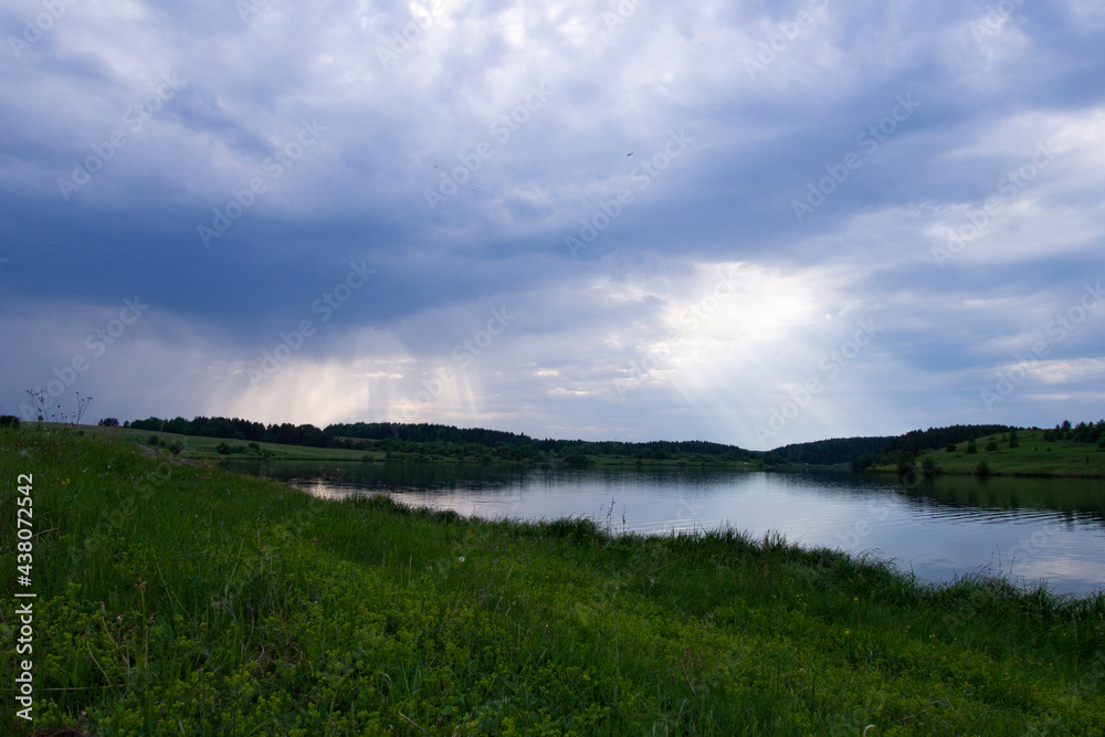 Stormy sky over the Sinyachikha River in the Sverdlovsk region (Ural, Russia) Stormy sky over the Sinyachikha River in the Sverdlovsk region (Ural, Russia)