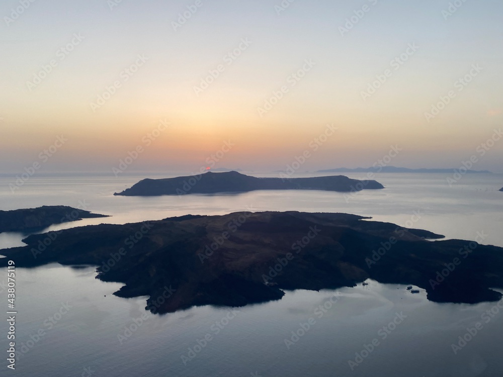 sunset in Santorini, helicopter view, vulcano sunset in Santorini, helicopter view, vulcano