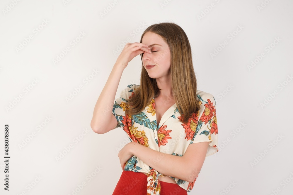 Very upset, charming, nice woman touching nose between closed eyes, want to cry, having stressful relationship, being tired, having troubles with work Very upset, charming, nice woman touching nose between closed eyes, want to cry, having stressful relationship, being tired, having troubles with work