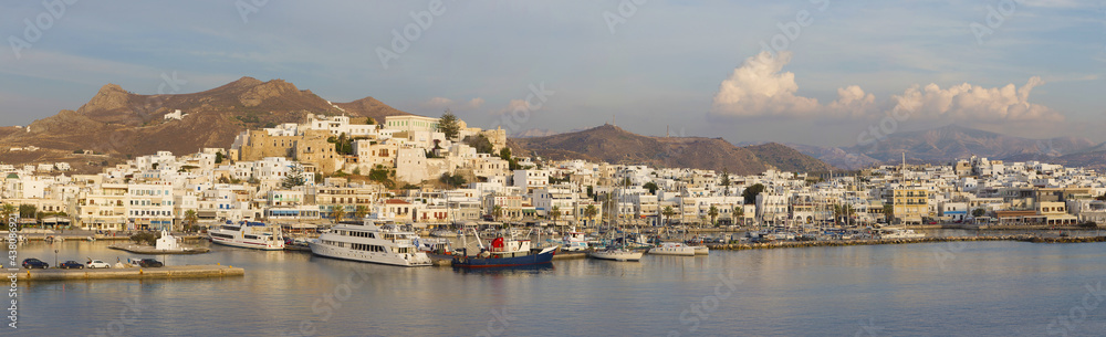 CHORA, GREECE - OCTOBER 7, 2015: The panorama of town Chora (Hora) on the Naxos island at evening light in the Aegean Sea.