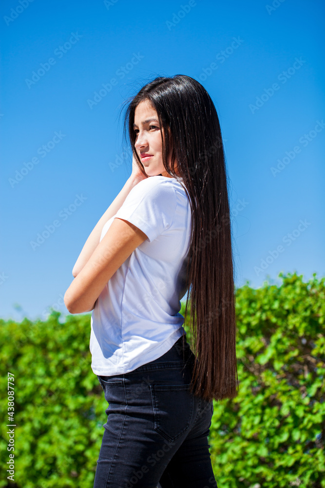 Portrait of a young beautiful girl in summer park Portrait of a young beautiful girl in summer park