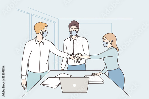 Success, cooperation, teamwork during covid-19 concept. Young business partners workers in face medical masks shaking hands meaning agreement in office during pandemic vector illustration 
