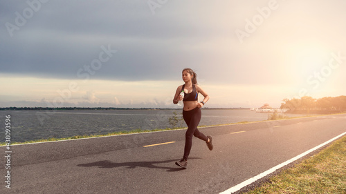 Strong runner being run go on the street, Young people running exercise on road.