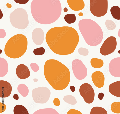 Seamless pattern of different circles, isolated on beige background. A hand-drawn pattern of colorful shapes, in flat style. Suitable for web and print design.