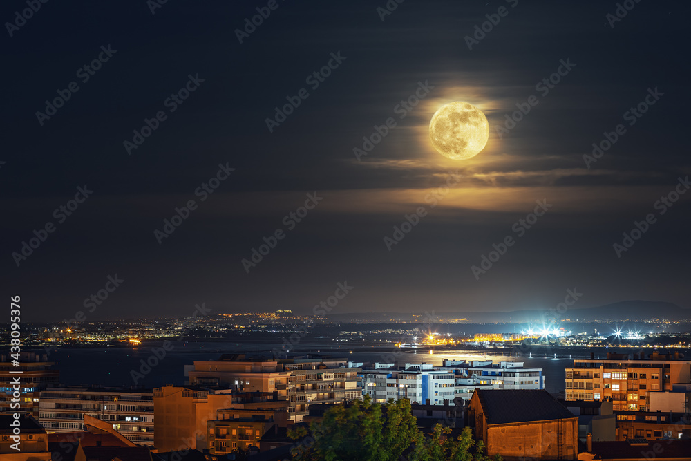 super big moon. night photography. beauty of the night city in the moonlight