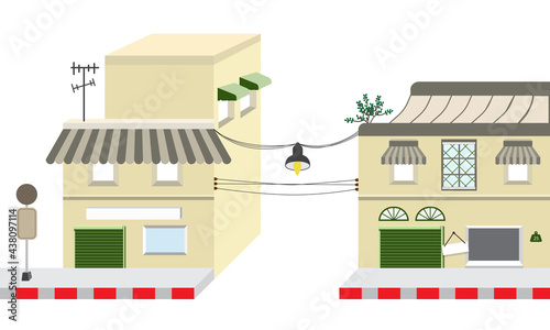 Yellow building on the road style vintage. 2 storey commercial building There are electrical wires connecting the building on white background. Vector ,illustration. 