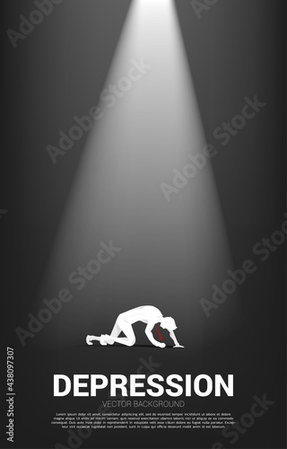 silhouette of businessman on knee in the light. Concept for fail and depress people.