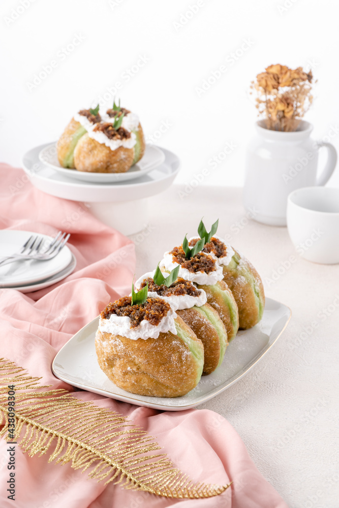 A bombolone or bomboloni is an Italian filled doughnut and is eaten as a snack food and dessert. This Bomboloni has many flavors like strawberry, chocolate, blueberry, etc. A bombolone or bomboloni is an Italian filled doughnut and is eaten as a snack food and dessert. This Bomboloni has many flavors like strawberry, chocolate, blueberry, etc.