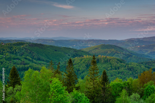 Fototapeta Naklejka Na Ścianę i Meble -  Panorama of the Silesian Beskids from Rownica peak at sunrise. Poland