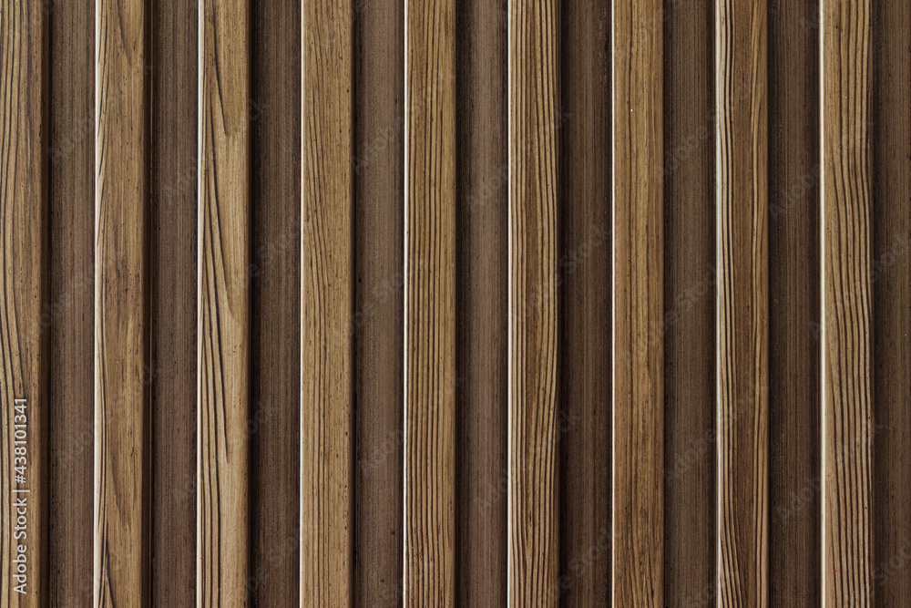 Textured, dark-brown wooden wall. Textured, dark-brown wooden wall.