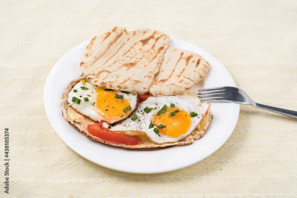sunny side up eggs with pita bread