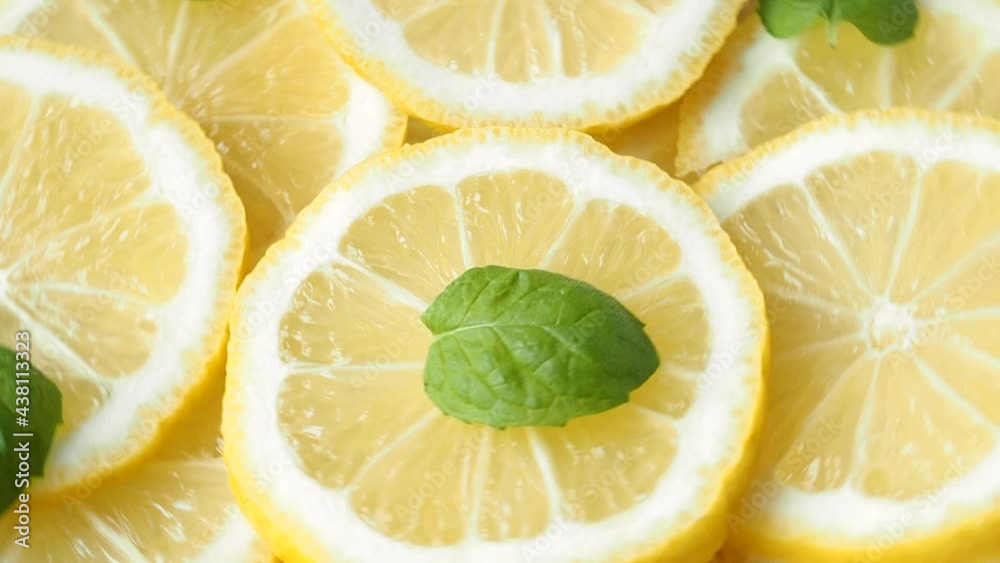 Ripe juicy lemon sliced rotates. Closeup of citrus. Ripe juicy lemon sliced rotates. Closeup of citrus.