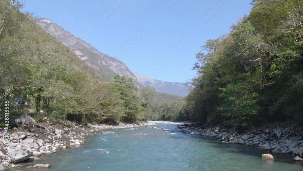 flowing river in the woods among the mountains flowing river in the woods among the mountains