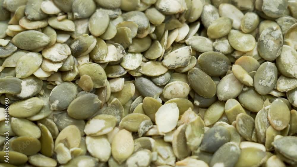 Pumpkin Seeds, Close-up. Background of Peeled Pumpkin Seeds. Pumpkin Seeds Are Isolated. Healthy Vegan Cleansing Anti-Anthelmintic Diet and Food.
