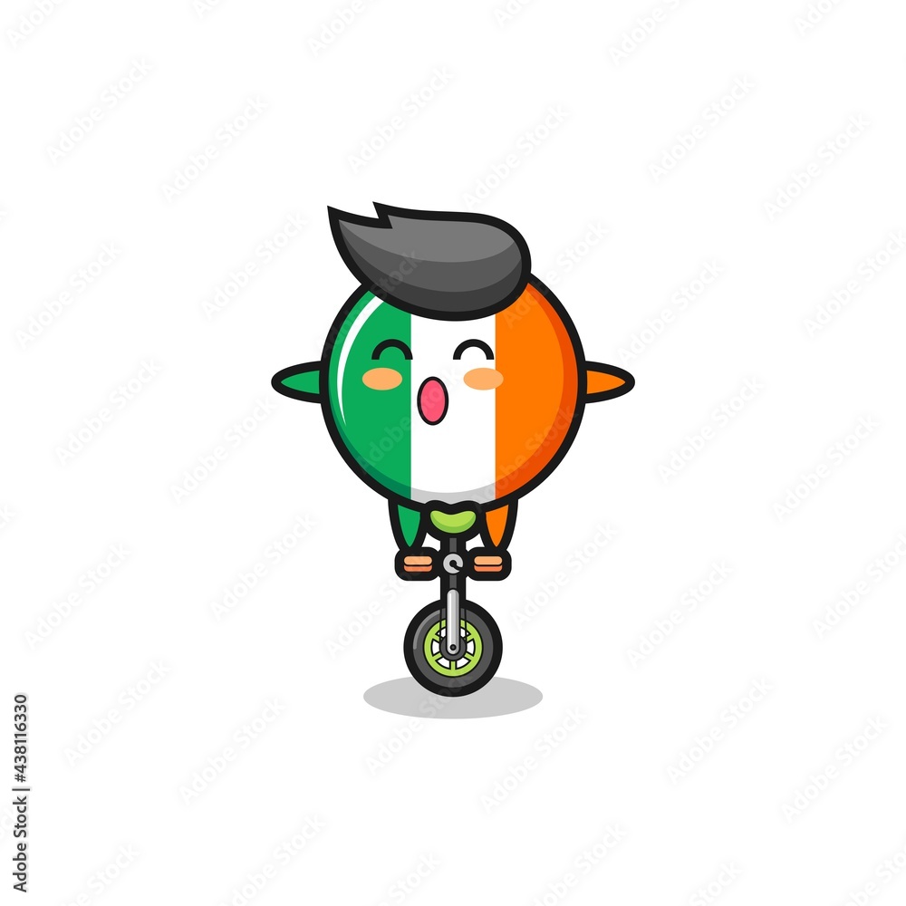 The cute ireland flag badge character is riding a circus bike The cute ireland flag badge character is riding a circus bike