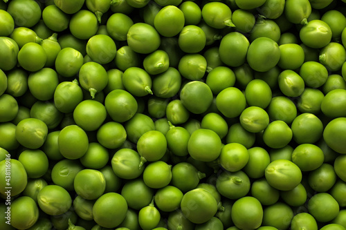 Fresh raw green peas as background, top view © New Africa