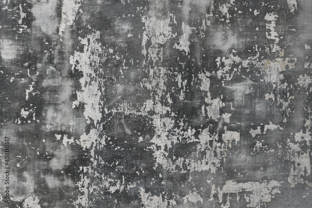 abstract gray painted old wall for background or texture, peeling paint and stucco with cracks like grunge style