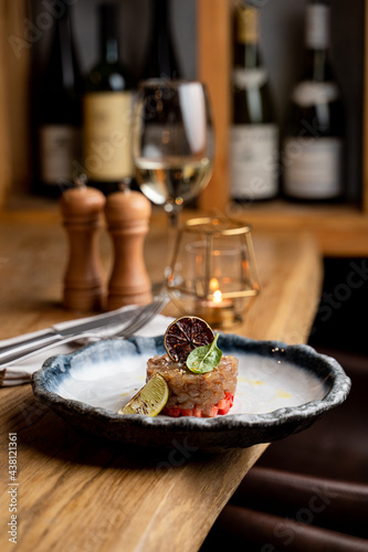 Bilde på lerret Seafood restaurant tartar with fresh raw fish and strawberry, modern fusion cuis