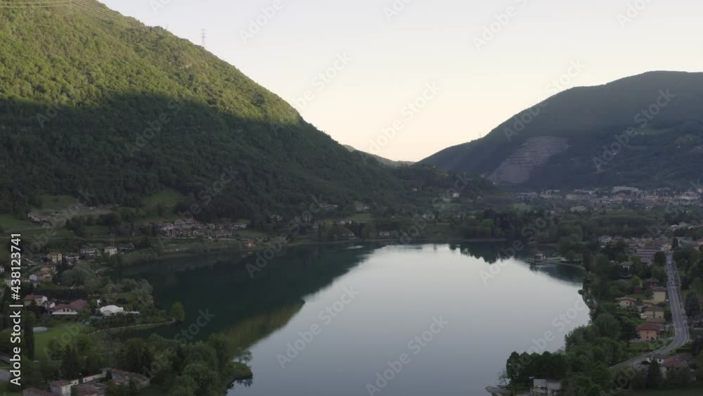 Drone flying over Lake Endine with the mountains in the background,Lombardy,Italy.