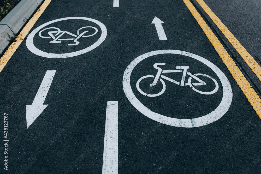 Fototapeta premium Close up of asphalt road for cyclists in two directions