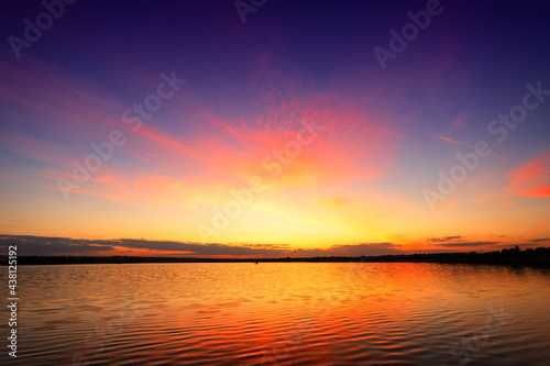 Beautiful landscape with sunset, sunrise on the lake © pobaralia