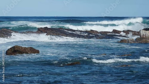 Atlantic ocean waves breaking off the coast of the Cape of Good Hope, Cape Point, South Africa.